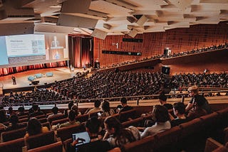 A full auditorium at the opening session of CHI 2023 in Hamburg.