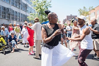 Festival goers dance at previous CCCADI street festival. Photo by Tatiana Nancy.