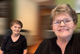 A selfie of two old women who are sisters. My sister on the left is farther back in the frame, and I am closer to the camera on the right. A motion blur was used on the background for a sense of passing time.