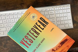 author’s image of her copy of Yesteryear sitting on a white keyboard