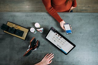 A customer making online payment using virtual debit card