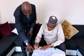 Abba Kyari takes bill to Buhari in London for signing. Credit: Presidency