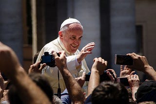 Pope Francis meeting people at St Peter’s Square, Vatican City State. Credit: Alfredo Borba / Wikimedia Commons