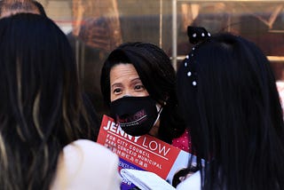 Jenny Low, one of the leading candidates of City Council District 1, on the campaign trail in Chinatown.