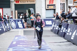 Woman on the finish line of CCC UTMB