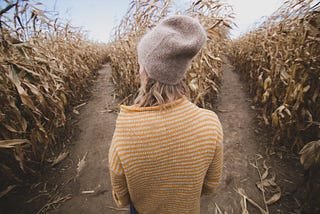 Woman in cornfield path