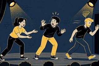 Three improv performers on stage fall out of sync — one confused, one hesitant, and one walking off — while an audience watches under stage lights.