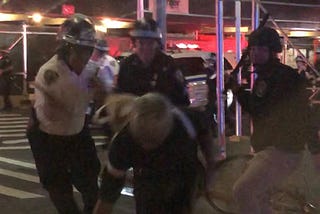 Three armed NYPD officers violently beat a cyclist with batons in Midtown Manhattan