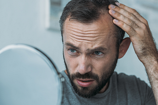 The Man’s Guide To Hair Loss: How To Stop Balding