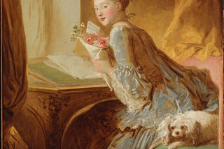 “The Love Letter” by Jean Honore Fragonard, depicting a young woman at her writing table looking up at the viewer while holding a letter