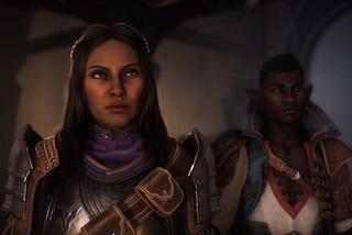 A closeup of the customizable main character of Dragon Age: The Veilguard looking slightly to the right, as an NPC companion stands in the background.