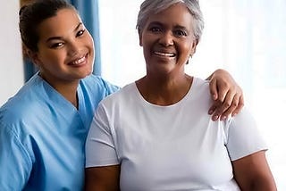 professional home health care aide with client