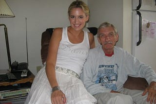 Dad and daughter on a chair