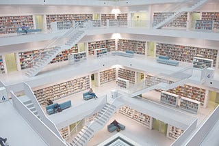 A multi-floor library building with thousands of books tidily organized into shelves