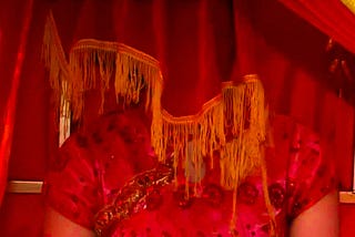 A Chinese bride covered with a red veil.