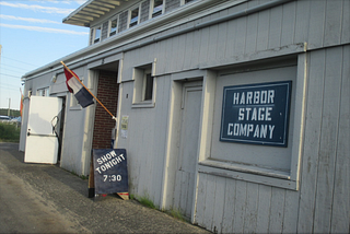 A Brief History of WHAT and the Harbor Stage Company