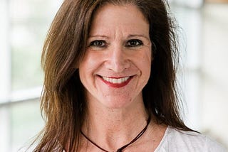 College professor smiling