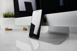 iOS devices on desk.