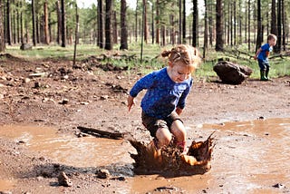 Why adults need to learn to jump and play in mud puddles?