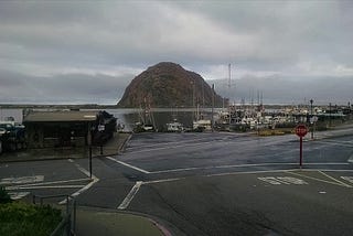 Color photo by Stella Martann of The infamous harbor Rock at the end of the jetty.