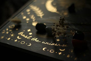 Metal plate with gold writing and designs