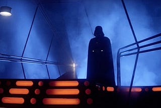 Darth Vader standing ominously in The Empire Strikes Back.