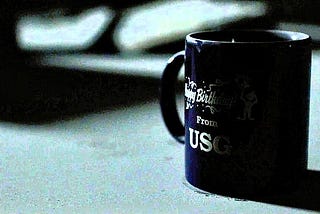 A blue mug on a table