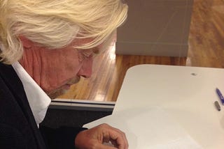 The image above is billion business tycoon, Richard Branson who is known to habitually  write to-do lists.