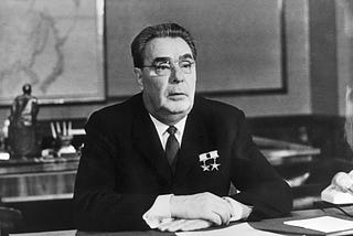 Leonid Brezhnev sitting at a desk