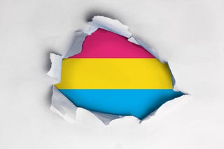 <a href=’https://www.freepik.com/photos/gay-flag'>Gay flag photo created by Vectorium — www.freepik.com</a> Ripped Paper with Pansexual flag in the middle