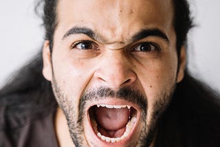 screaming man with mouth open