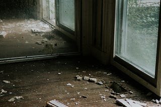 debris lying on floor of destroyed building