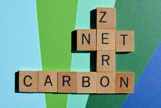What role does carbon offsetting play in reaching net zero?