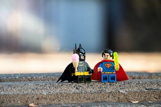 Two lego figures of batman and superman