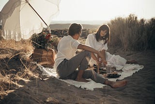couple on a picnic at the beach