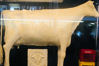 A photo of a cow made of butter.