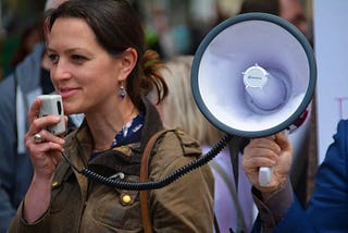 Woman with megaphone.