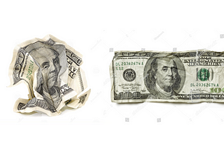 A crumpled 100 dollar bill on the right and a straight but wrinkled 100 dollar bill on the left.