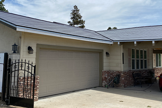 Cost/benefits of retrofitting a house with a Tesla solar roof.