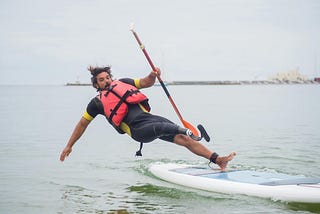 Man falling off windsurf