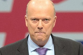 Chris Grayling in front of a Union Jack