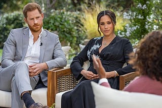 Prince Harry and Meghan Markle being interviewed by Oprah Winfrey