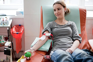 A woman donating blood