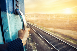 Vignettes of the Mind — Standing in the open door of a train watching the countryside roll past