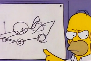 A screenshot from a Simpsons episode that shows Homer Simpson pointing at a drawing of car that he has made (it looks like its been drawn by a child)