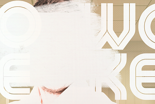 A White man’s face is whitened out by heavy swaths of white paint against a background with the letters, WOKE