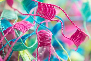 Red Green and Blue Abstract Painting showing tangled threads.