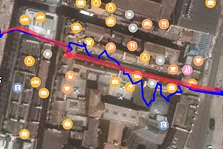 Top down view of a map showing two routes as coloured lines. One is a straight path through a tunnel, the other which is the gps tracked route varies wildly zigzagging all over the map.