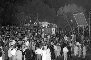 Crowd watching television