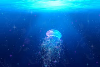 jellyfish with tentacles in the ocean, floating under the glowing surface